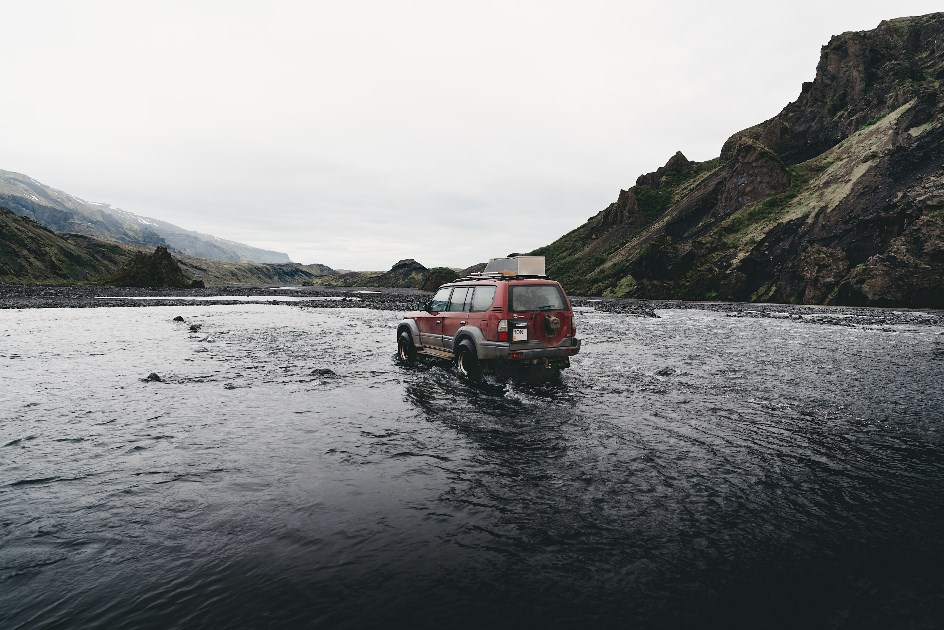 A super jeep crossing a river in the Icelandic Highlands