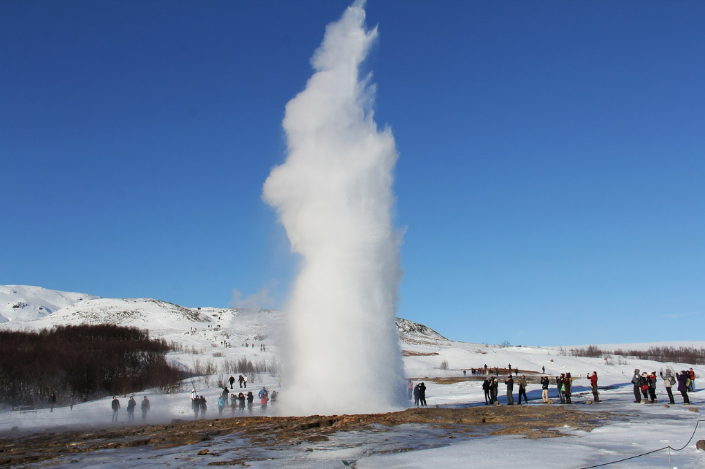 Witness an erupting geyser in Iceland