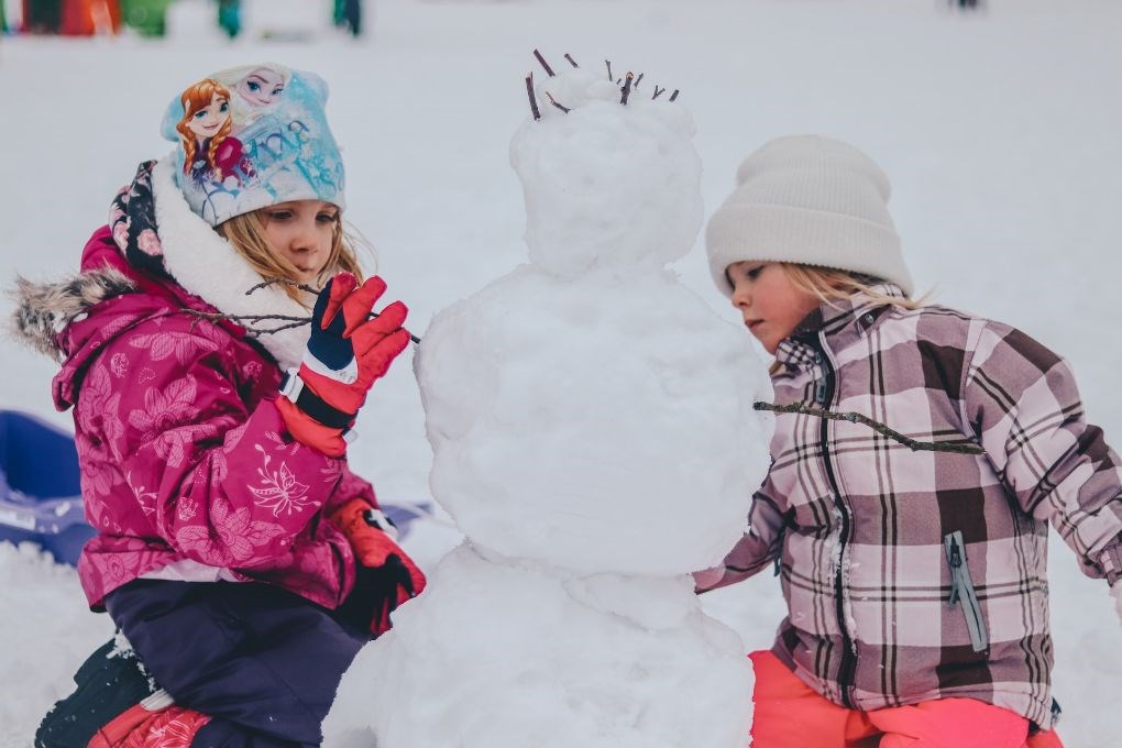 Kids playing in the snow in Iceland