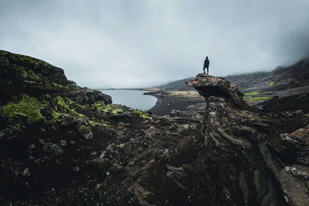 Traveller standing in front of Kleifarvatn Lake in Reykjanes, Iceland