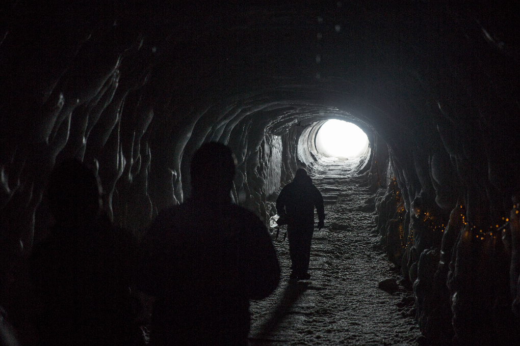 Exploring the inside of the ice tunnels in Langjokull glacier in Iceland