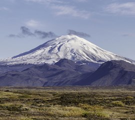 a distant shot of the volcano hekla in iceland