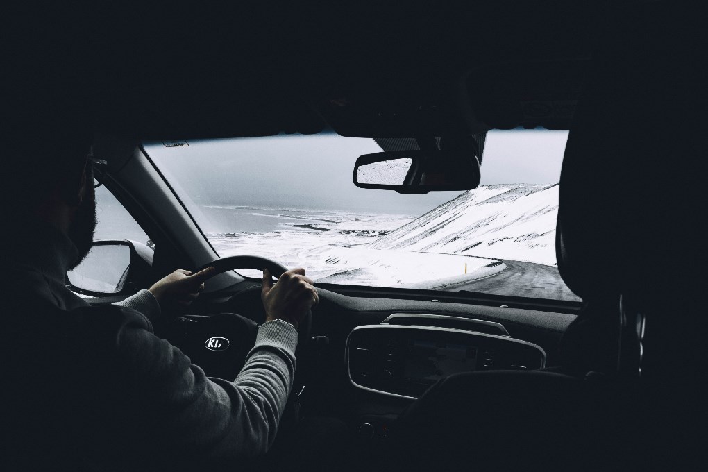 driving through the winter roads in Iceland