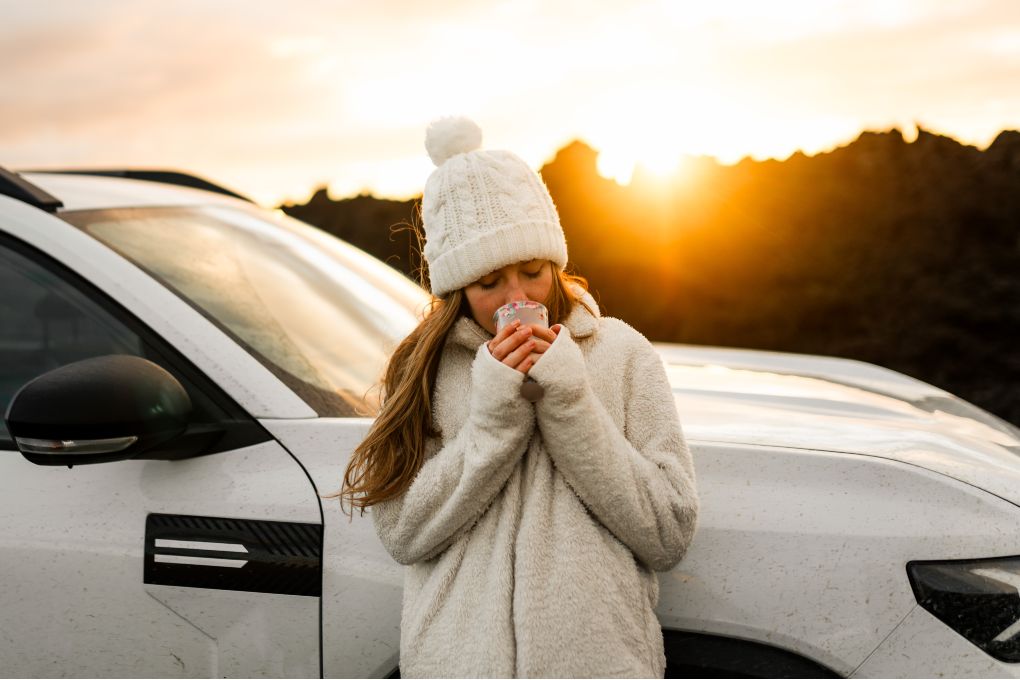 Woman during a road trip in fall in Iceland