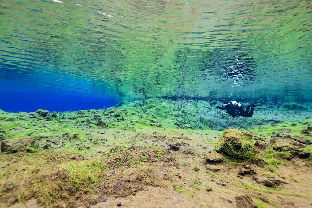 The water is crystal clear in Silfra, Iceland
